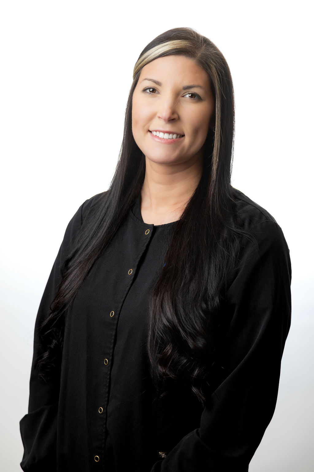 Professional headshot of a female team member in black scrubs — Meadowmont Dentistry in Chapel Hill, NC