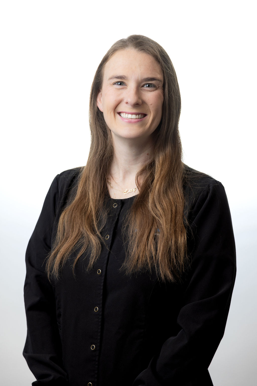 Professional headshot of a female team member in black scrubs — Meadowmont Dentistry in Chapel Hill, NC