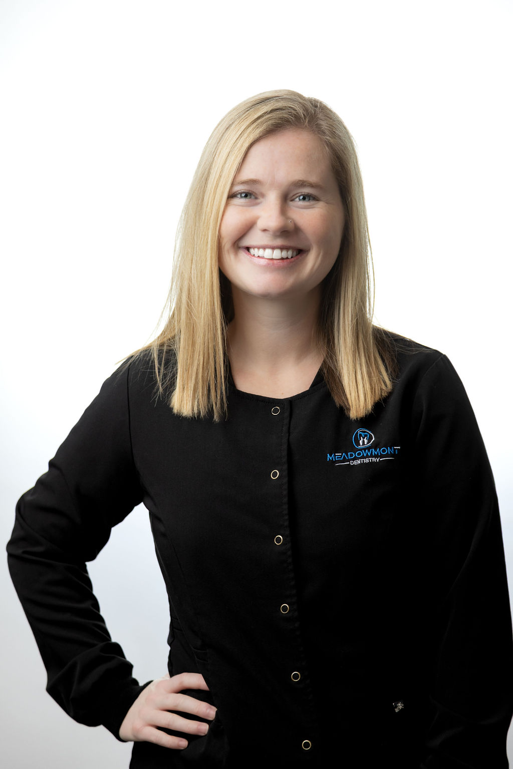 Professional headshot of a female team member in black scrubs — Meadowmont Dentistry in Chapel Hill, NC